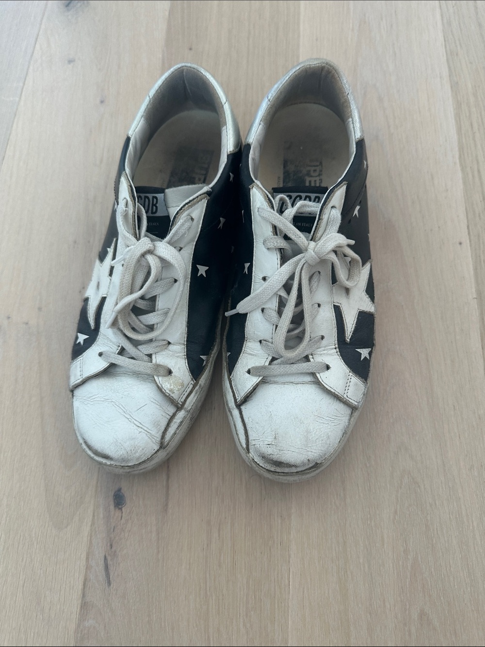 Golden Goose Black and White Star Low-Top Sneakers with Cream Accents